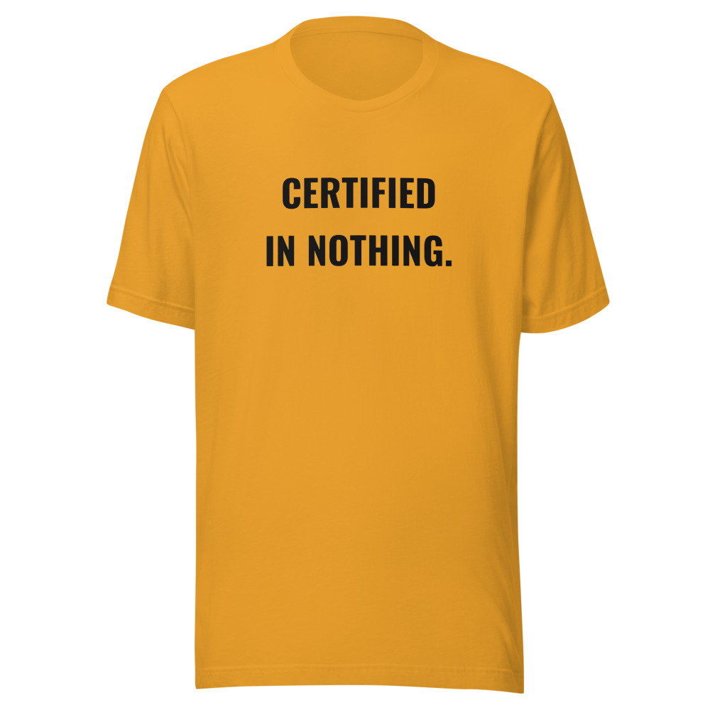 CERTIFIED IN NOTHING. on a mustard shirt